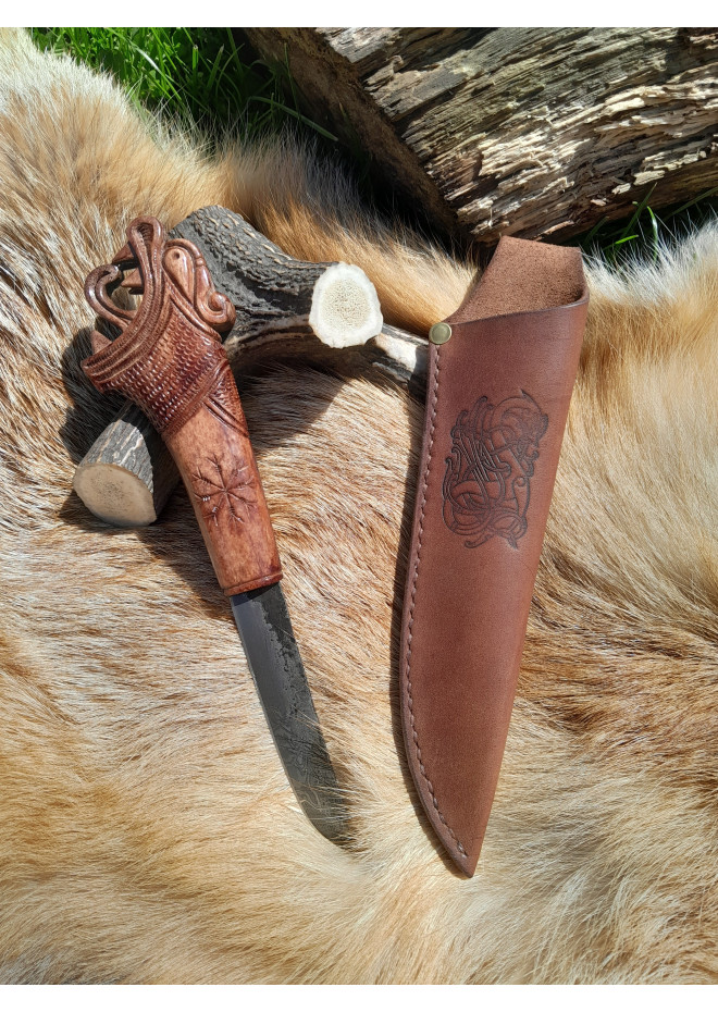 Functional Norse knife with hand-carved Dragon handle and leather sheath.
