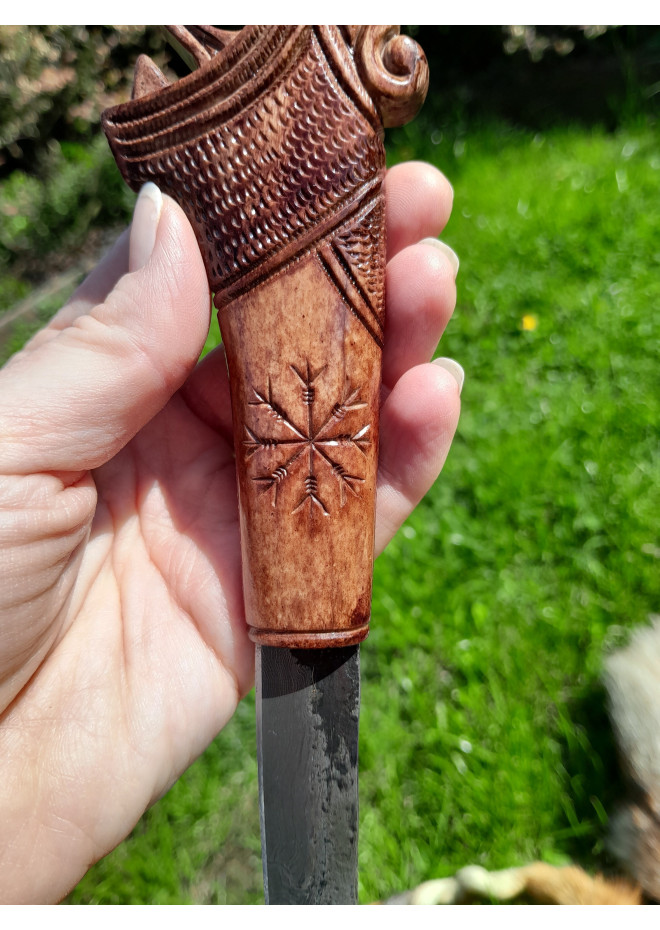 Functional Norse knife with hand-carved Dragon handle and leather sheath.