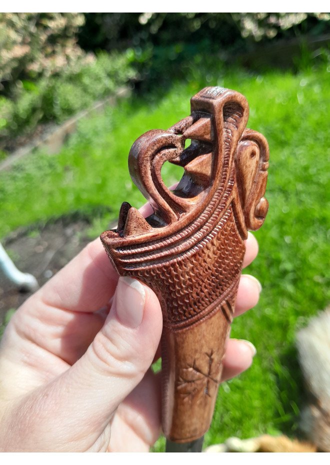 Functional Norse knife with hand-carved Dragon handle and leather sheath.