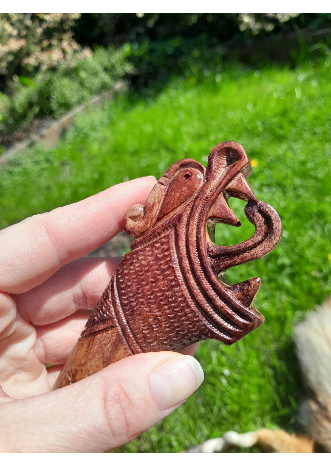 Functional Norse knife with hand-carved Dragon handle and leather sheath.
