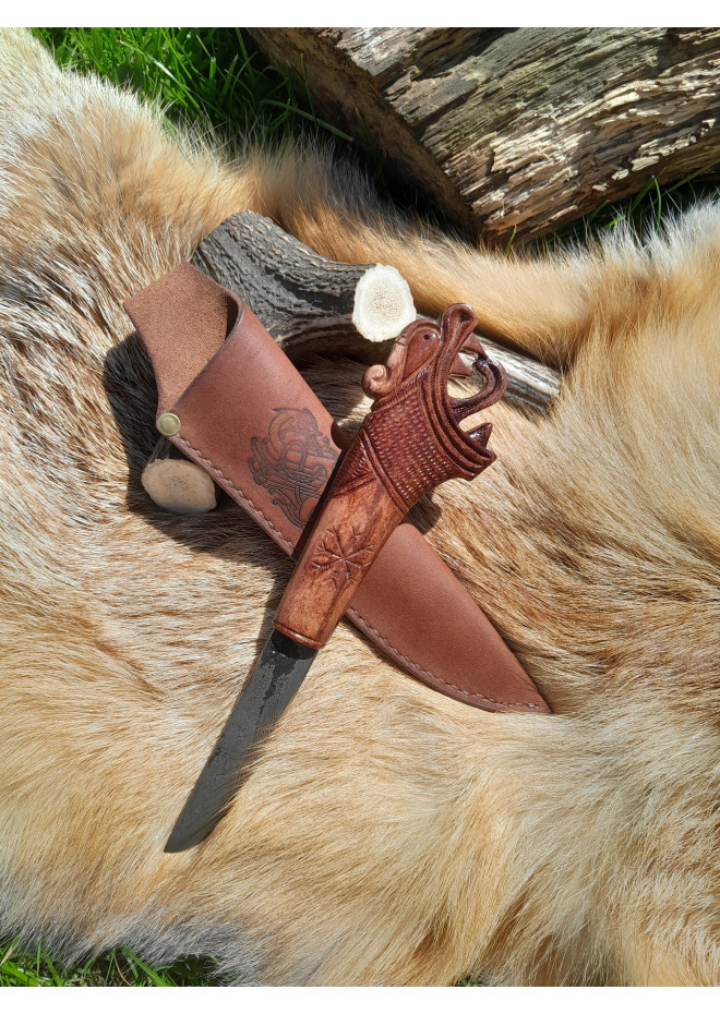 Functional Norse knife with hand-carved Dragon handle and leather sheath.