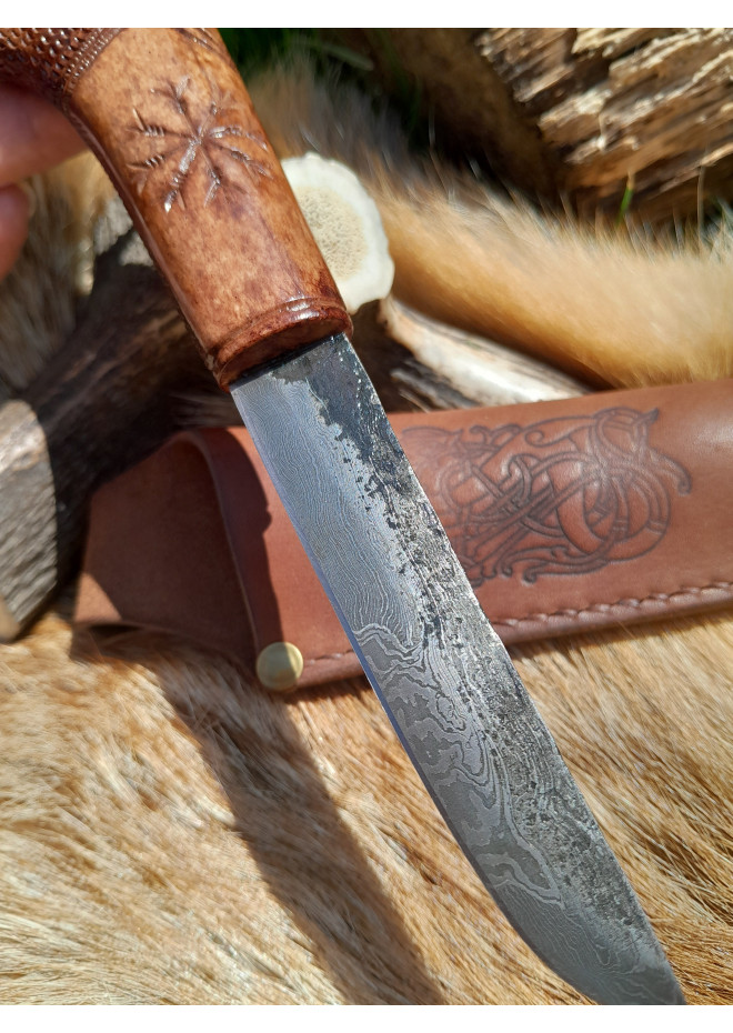 Functional Norse knife with hand-carved Dragon handle and leather sheath.