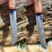 Functional Norse knife with hand-carved Dragon handle and leather sheath.