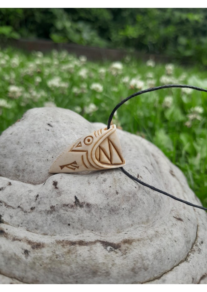 Dragon Viking amulet with runes.