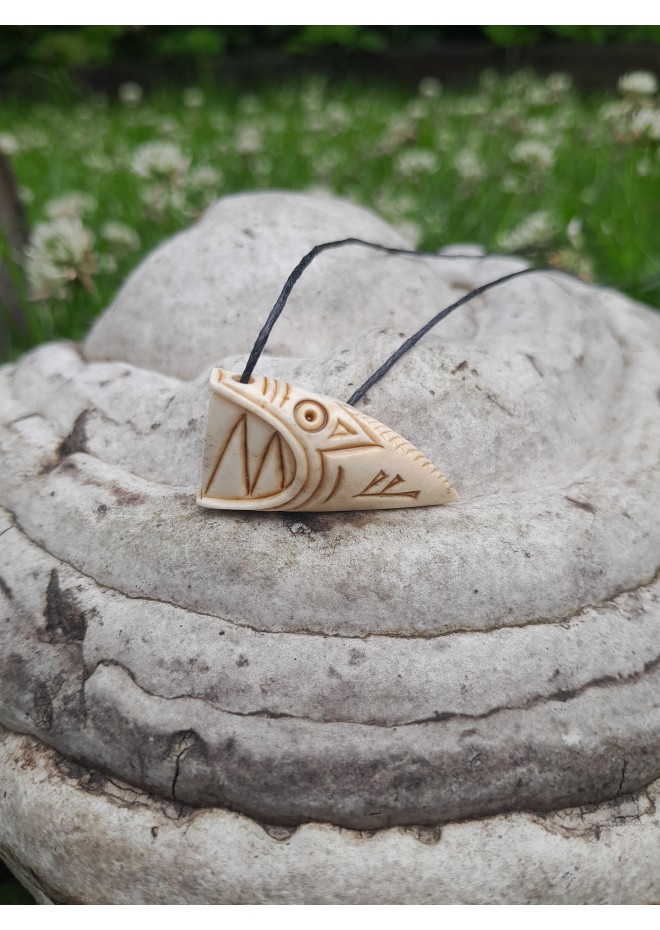 Dragon Viking amulet with runes.