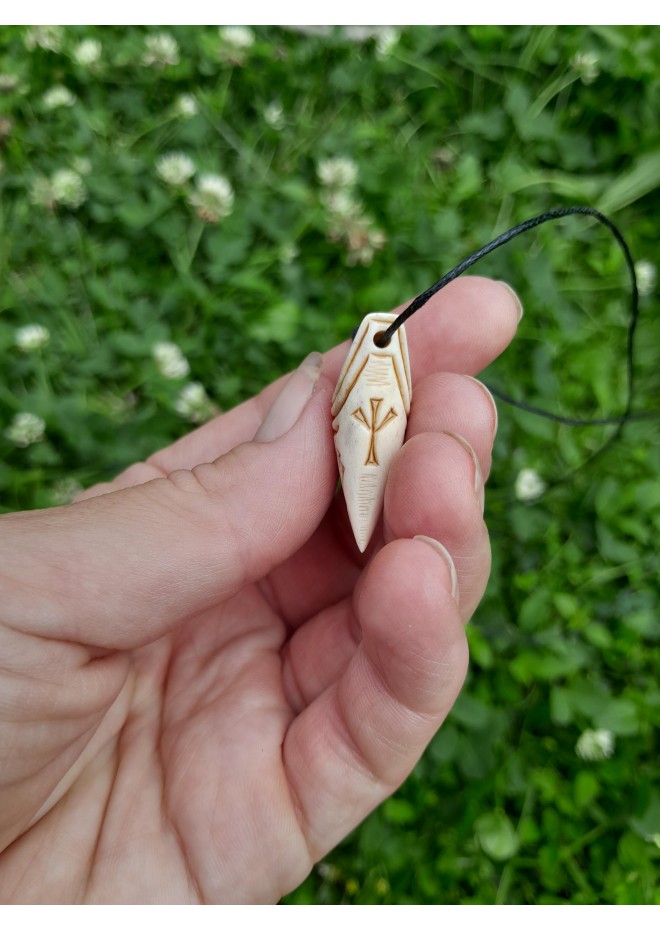 Dragon Viking amulet with runes.