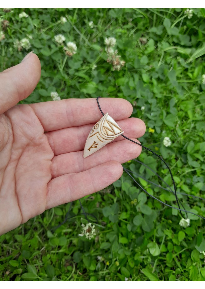 Dragon Viking amulet with runes.