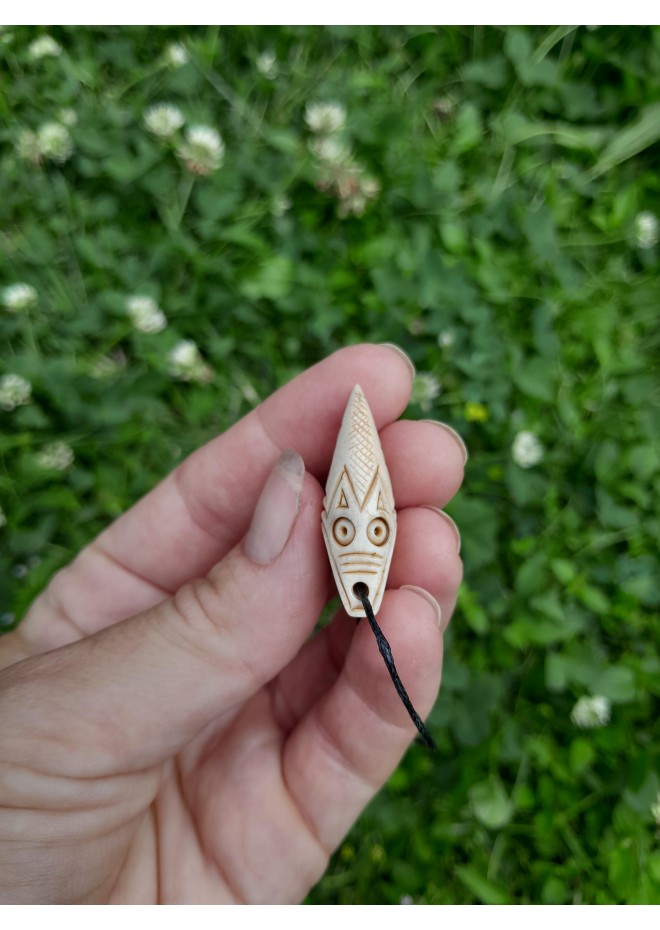 Dragon Viking amulet with runes.