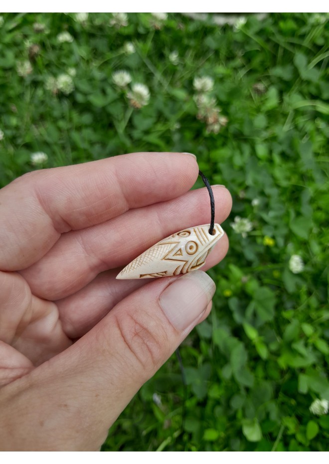 Dragon Viking amulet with runes.