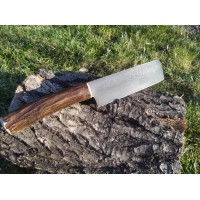 Hand-Forged Nakiri knife with Damascus blade and antler handle.