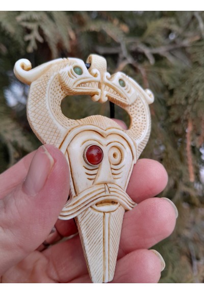 Viking god Odin amulet with Dragons. Antler hand-carved