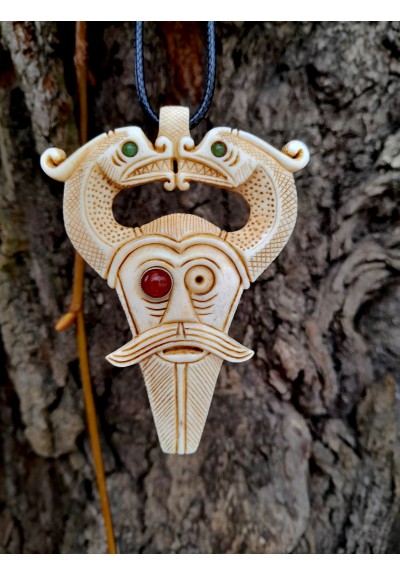 Viking god Odin amulet with Dragons. Antler hand-carved