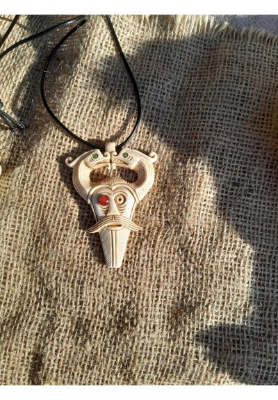 Viking god Odin amulet with Dragons. Antler hand-carved