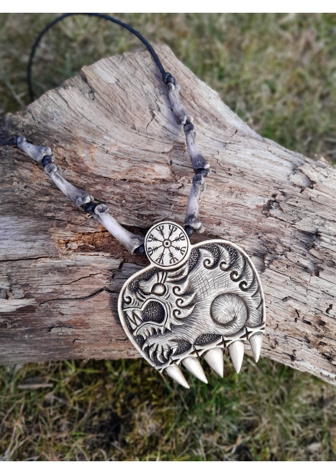 Hand-carved Wolf paw amulet – helm of awe & algiz rune