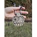 Hand-carved Wolf paw amulet – helm of awe & algiz rune