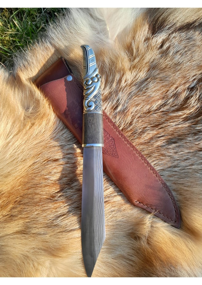 Norse scramasax with bronze Raven handle. Damascus blade
