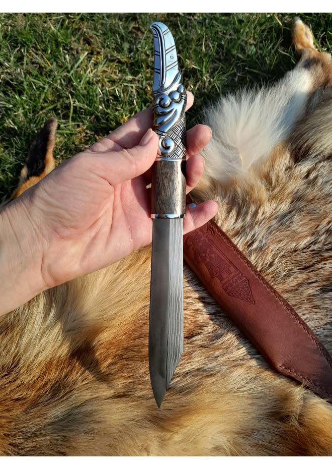 Norse scramasax with bronze Raven handle. Damascus blade