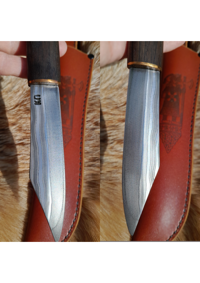 Handcrafted Norse knife. Damascus steel & Raven handle.