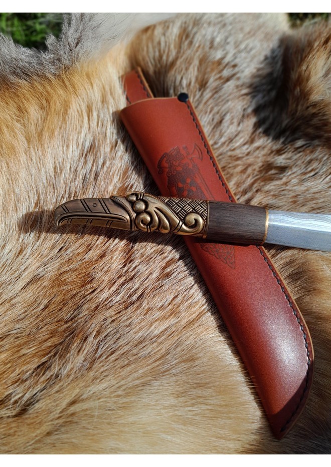 Handcrafted Norse knife. Damascus steel & Raven handle.