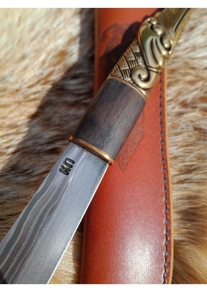 Handcrafted Norse knife. Damascus steel & Raven handle.