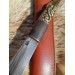 Handcrafted Norse knife. Damascus steel & Raven handle.