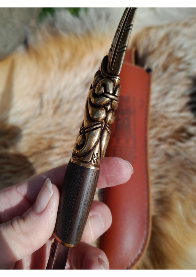 Handcrafted Norse knife. Damascus steel & Raven handle.