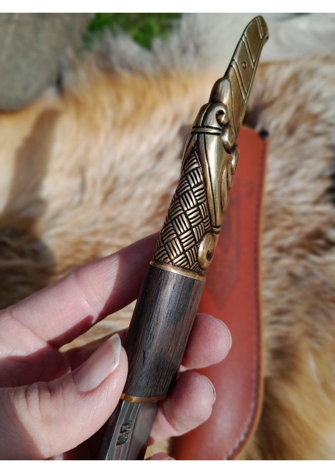Handcrafted Norse knife. Damascus steel & Raven handle.