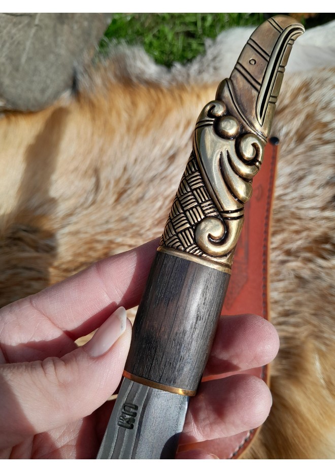 Handcrafted Norse knife. Damascus steel & Raven handle.