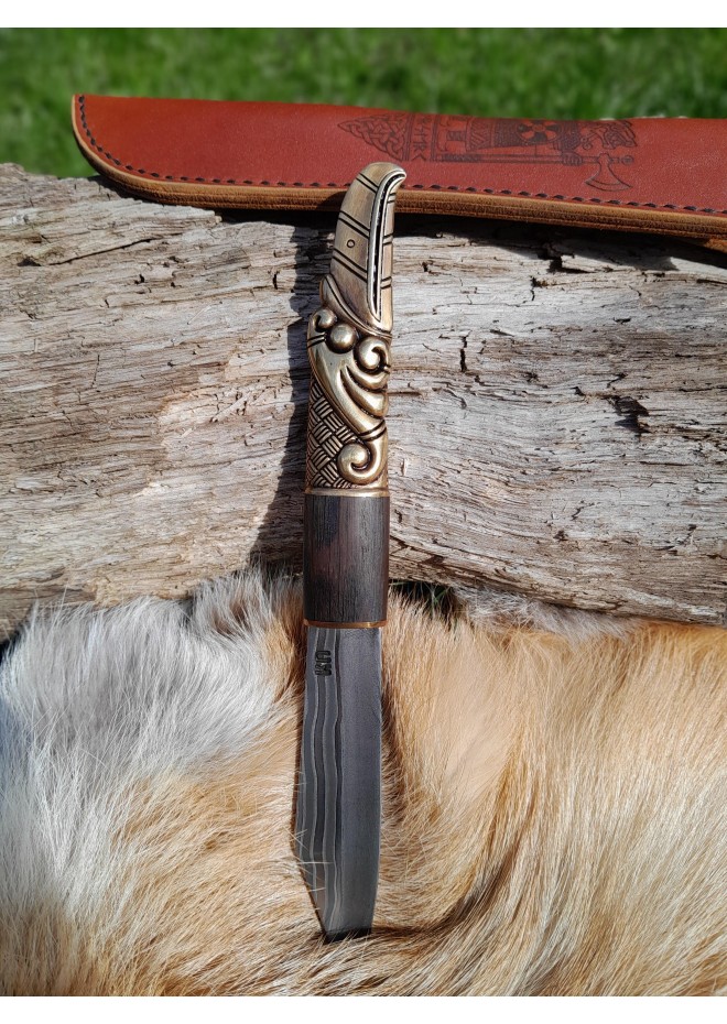 Handcrafted Norse knife. Damascus steel & Raven handle.