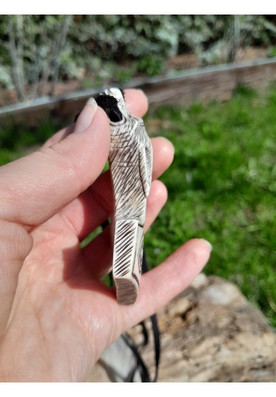 Hand-carved knotted Mjolnir amulet with Wolf head