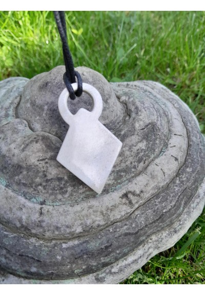 Hand-carved amulet