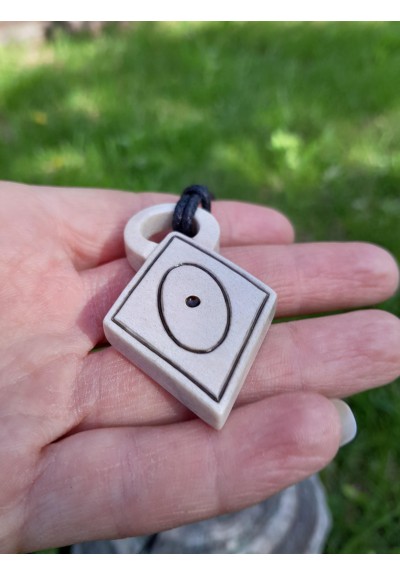 Hand-carved amulet
