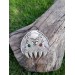 Double Wolf head with green and red eye. Carved Odin’s face