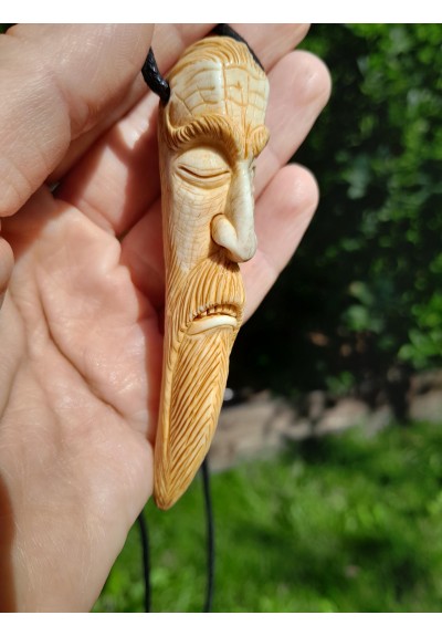 Odin amulet. Norse talisman carved from antler