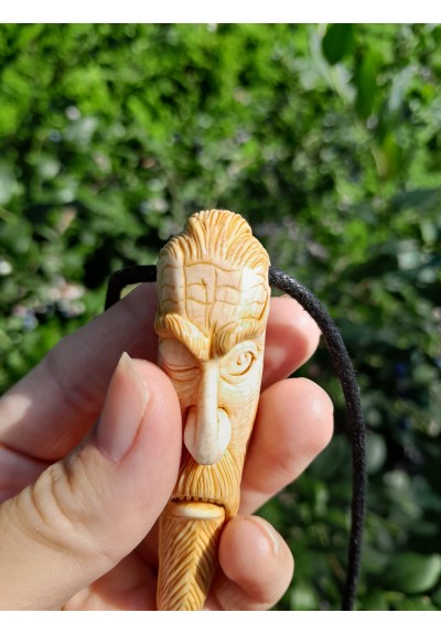 Odin amulet. Norse talisman carved from antler