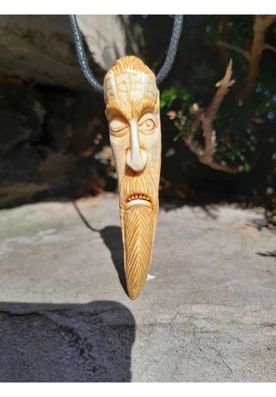 Odin amulet. Norse talisman carved from antler