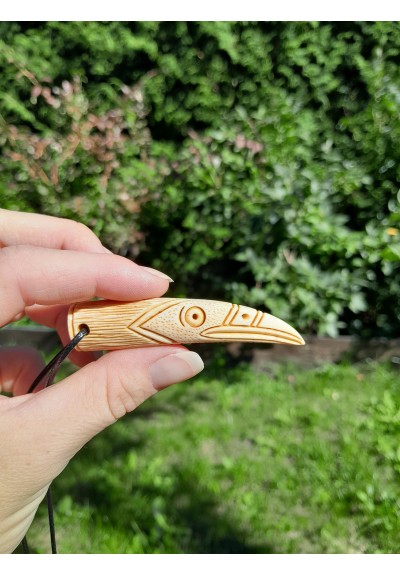 Hand-carved Viking raven pendant with Algiz rune. Norse motif jewelry