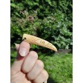 Hand-carved Viking raven pendant from antler