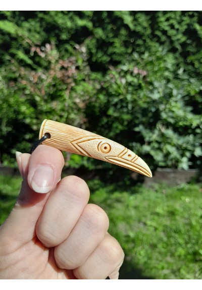Hand-carved Viking raven pendant with Algiz rune. Norse motif jewelry