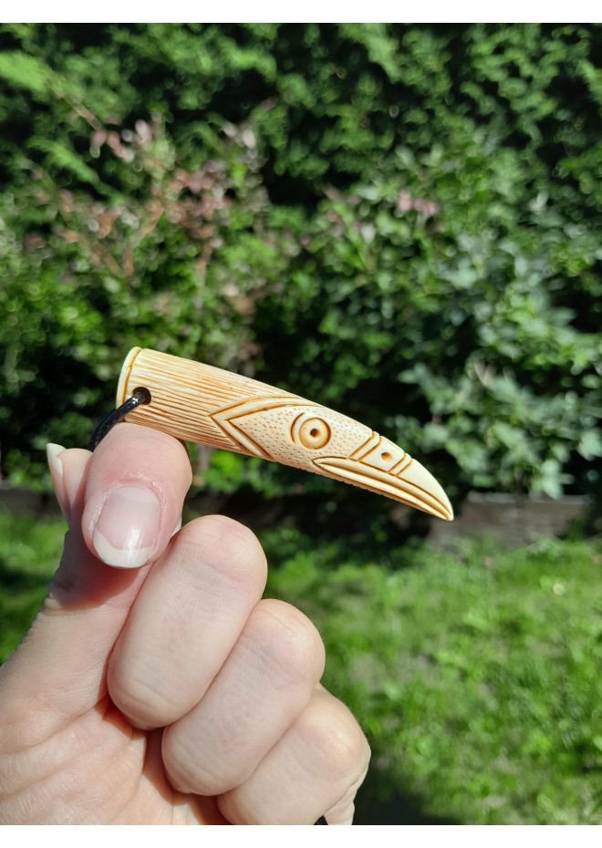 Hand-carved Viking raven pendant from antler