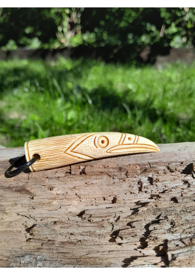 Hand-carved Viking raven pendant from antler