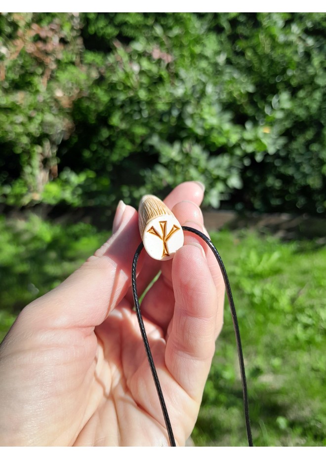 Hand-carved Viking raven pendant from antler