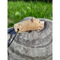 Hand-carved Viking bear amulet with Algiz rune