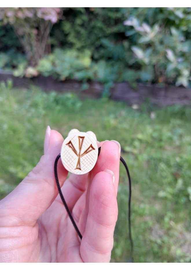 Hand-carved Viking bear amulet with Algiz rune