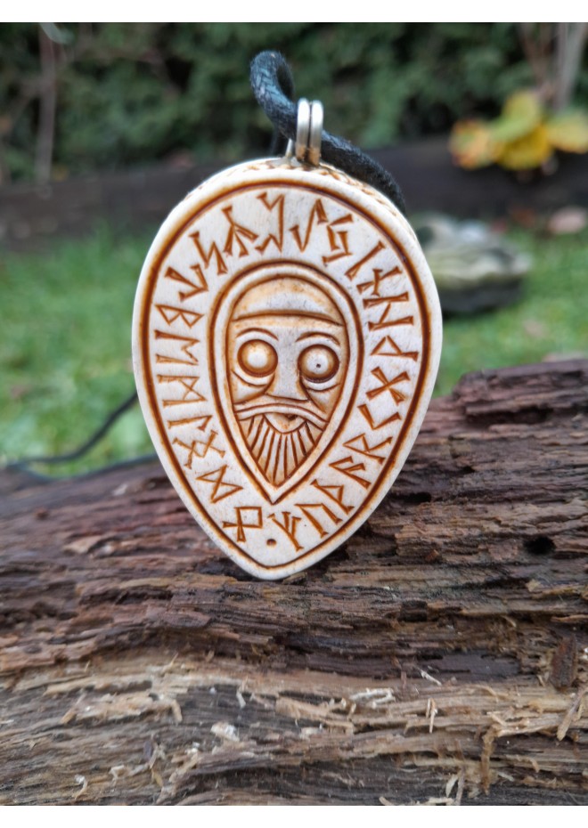 Handcrafted moose antler amulet featuring Odin and runes