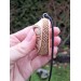Handcrafted moose antler amulet featuring Odin and runes