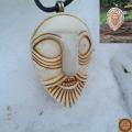 Handcrafted moose antler amulet featuring Odin and runes