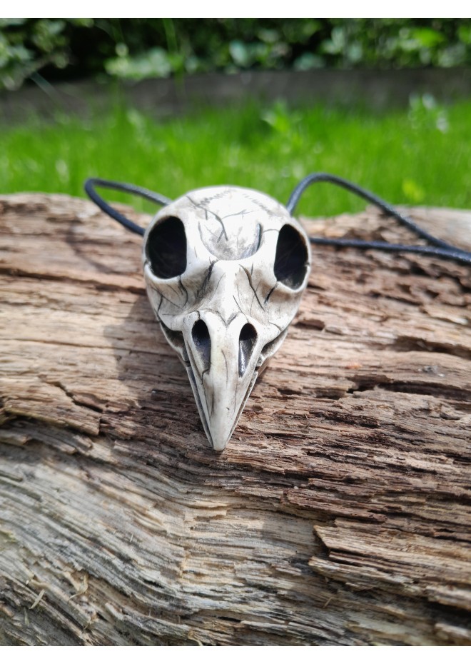 Hand-carved moose antler Viking raven skull amulet