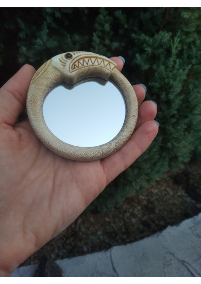 Viking mirror with Jormungand design
