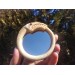Viking mirror with Jormungand design